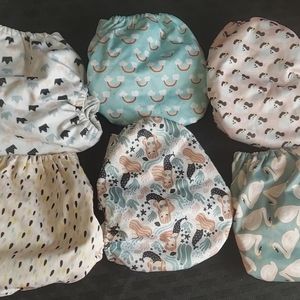 set of 6 BRAND NEW NEVER PREPPED CLOTH DIAPER, snap closure, pocket design
